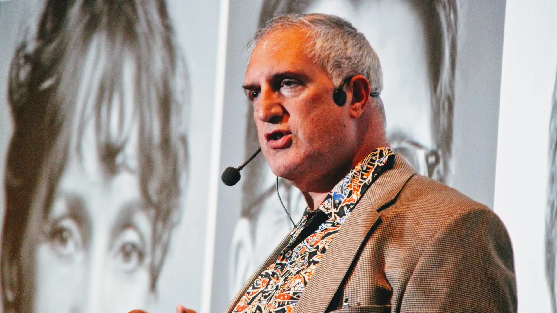 Joseph Riggio, Ph.D. speaking on stage